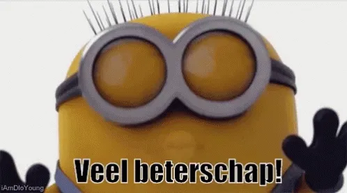 Een vrolijke gele minion met grote ronde brillen en een begroeting.
