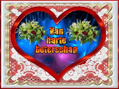 ᐅ beterschapswensen man - Beterschap plaatjes Text in een rood hart met bloemen op de achtergrond: "Van harte beterschap".