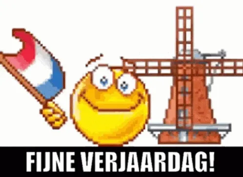 Een glimlachend gezicht met een vlag en een molen, met 'Fijne Verjaardag!' eronder.