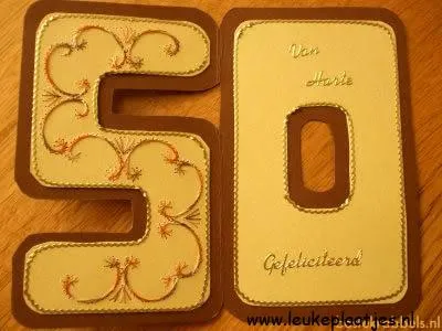 Gouden jubileumkaart met de cijfers 50 en de tekst "Van Harte Gefeliciteerd".
