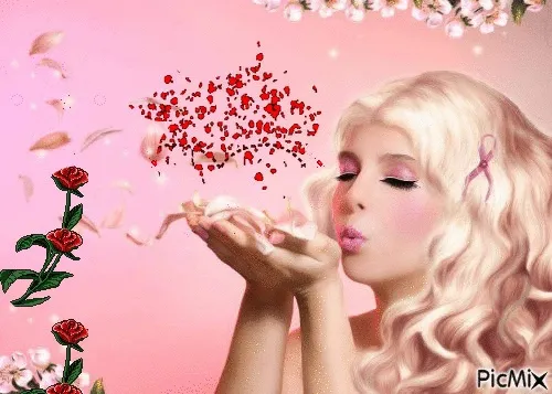 Vrouw met lange, golvende haren blaast bloemblaadjes in de lucht tegen een roze achtergrond.