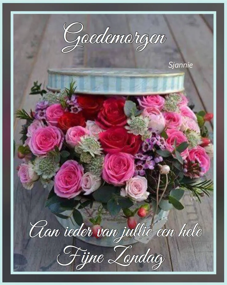 Een bloemenmand met rozen en een tekst voor een fijne zondag.