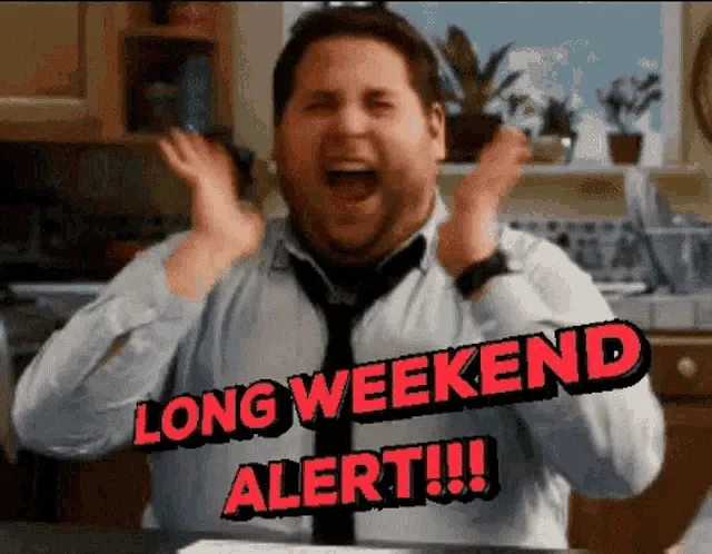 Een man juicht blij voor een lang weekend met een tekst "LONG WEEKEND ALERT!!!".
