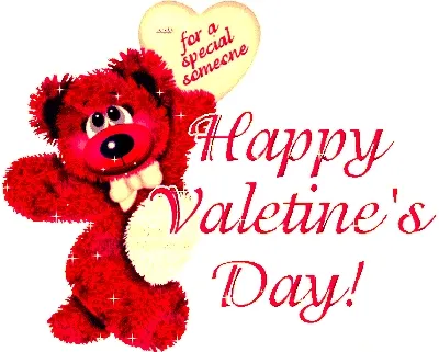 Pluche teddybeer met een hartje voor Valentijnsdag. Tekst: "Happy Valentine's Day!"